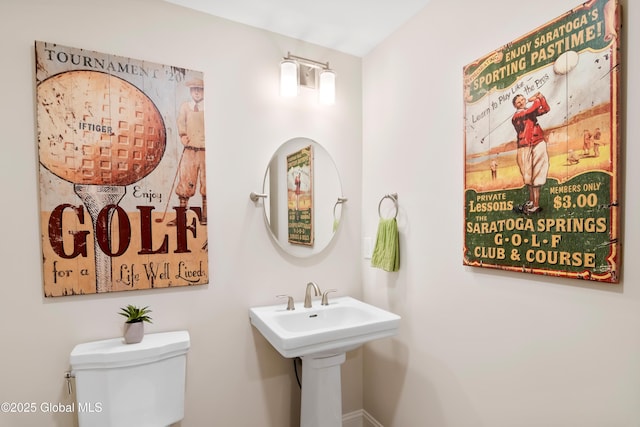 bathroom featuring a sink and toilet