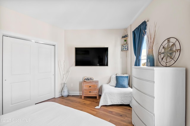 bedroom featuring wood finished floors