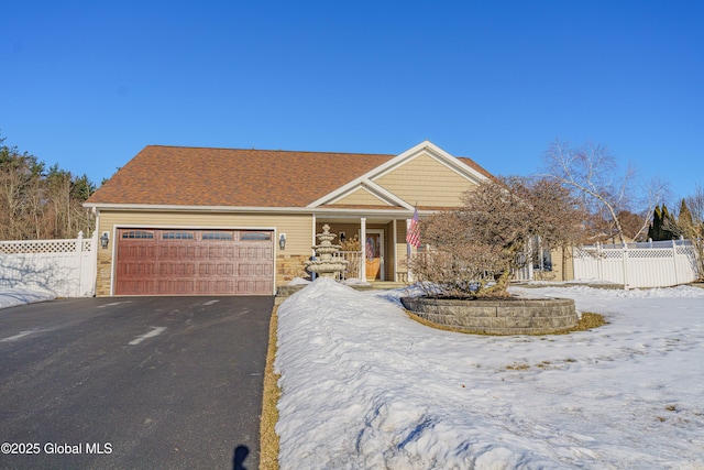 view of front of property featuring a garage