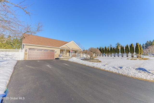 view of front of home featuring a garage