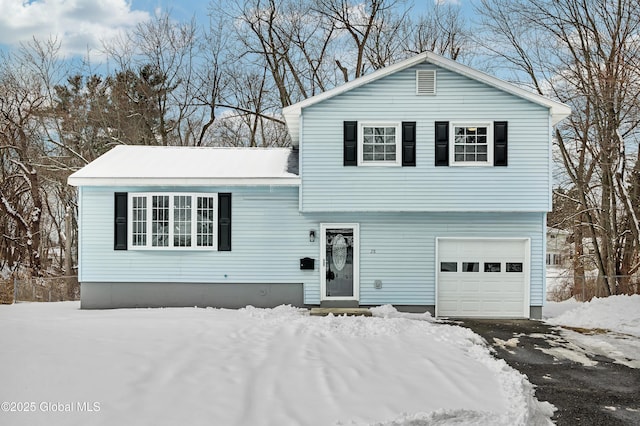 tri-level home featuring a garage