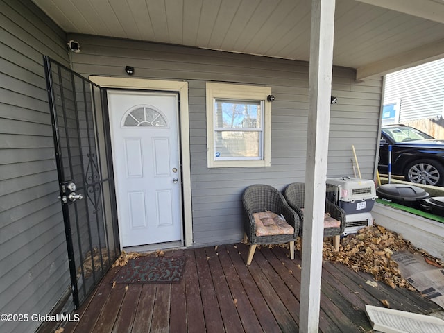 doorway to property featuring a porch