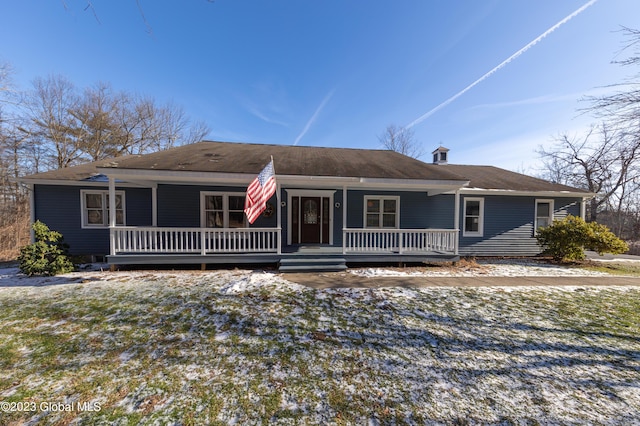 ranch-style home featuring covered porch