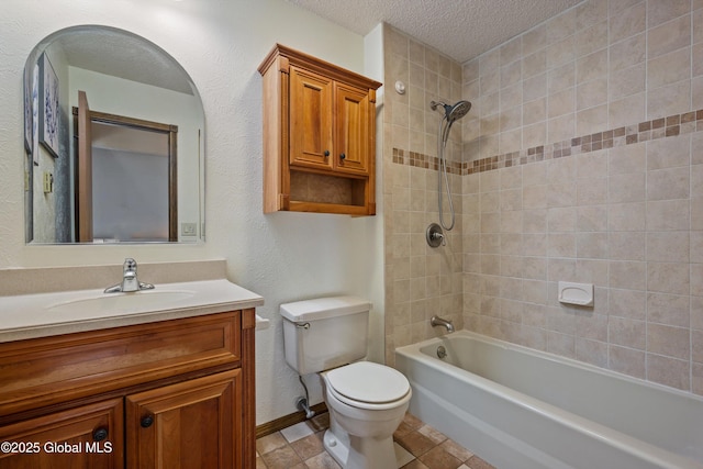 bathroom featuring baseboards, toilet, shower / tub combination, a textured ceiling, and vanity