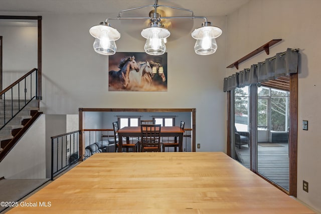 dining room featuring stairway