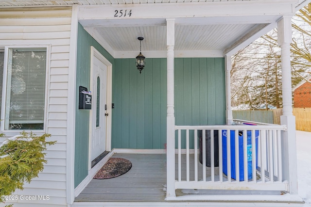 doorway to property featuring a porch