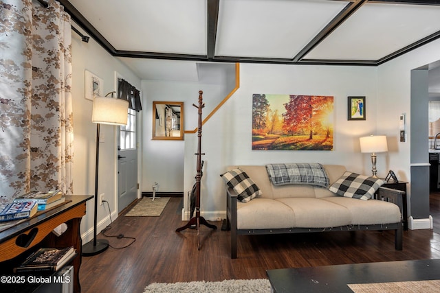 living room featuring dark wood-style flooring and baseboards