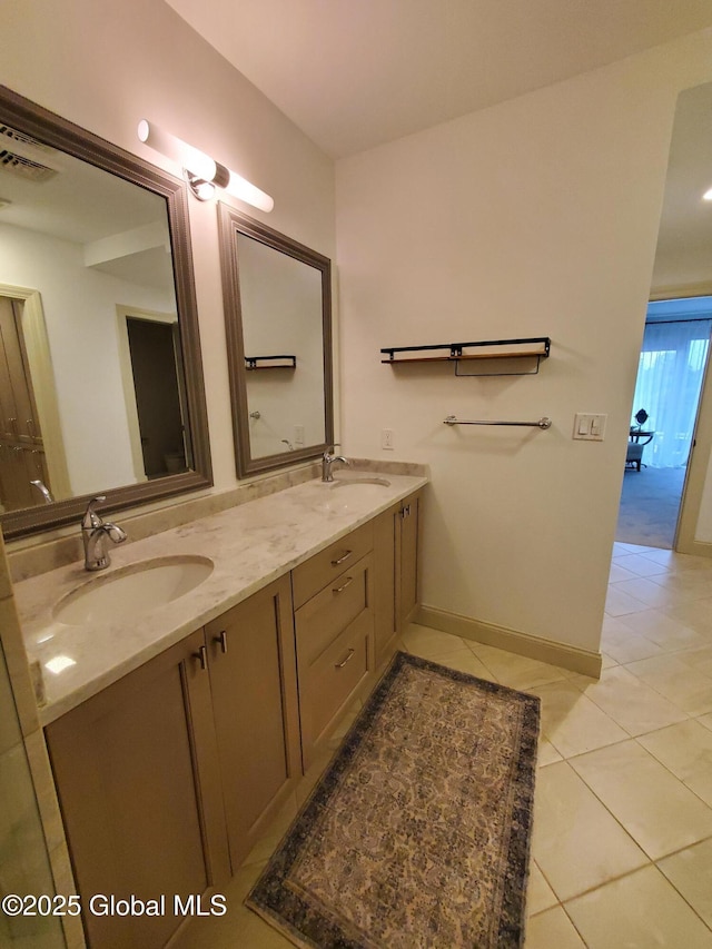 38 High Rock Ave Unit 6H, Saratoga Springs, NY 12866 - bathroom with double vanity and tile patterned floors