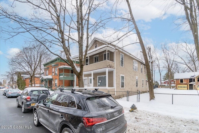 view of snow covered property