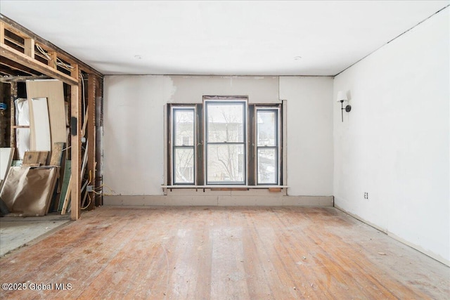 spare room with light wood-type flooring