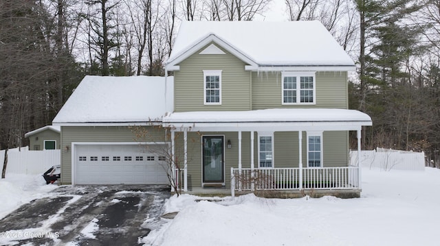 view of front of property with a garage and a porch