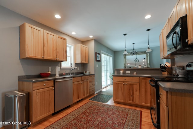 kitchen with pendant lighting, sink, range with electric stovetop, stainless steel dishwasher, and kitchen peninsula