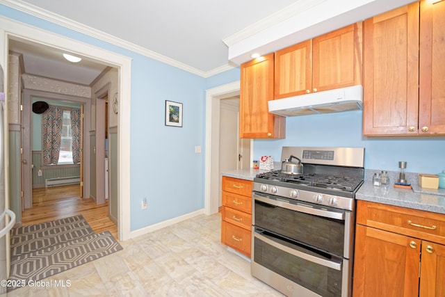 kitchen with baseboards, a baseboard radiator, crown molding, under cabinet range hood, and double oven range