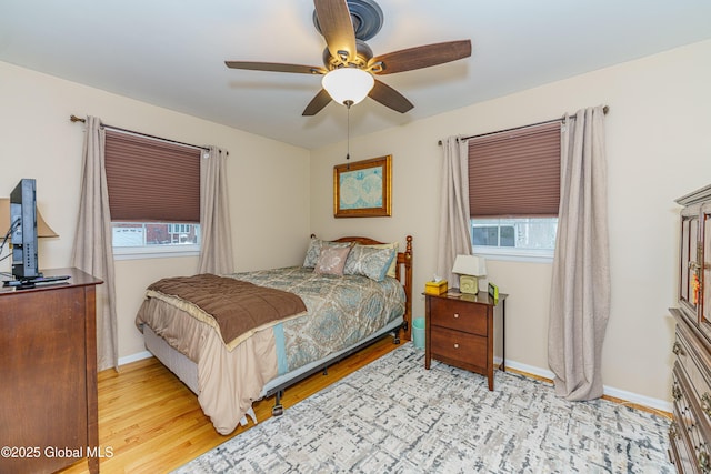 bedroom featuring ceiling fan and light wood-type flooring