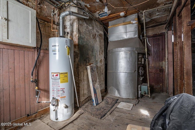 utility room with gas water heater