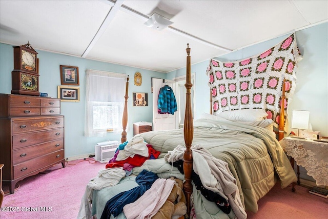 bedroom with light colored carpet