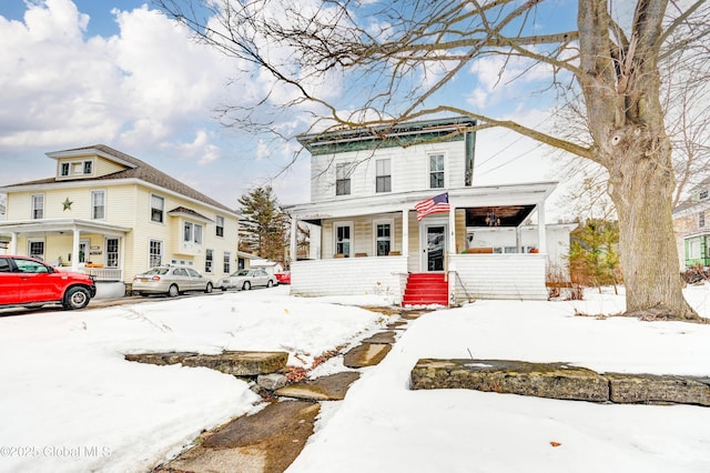 view of front of property featuring covered porch