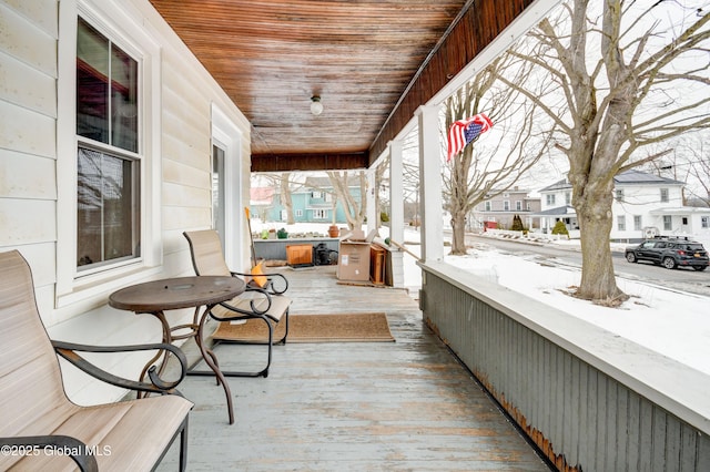 exterior space featuring a porch and a residential view