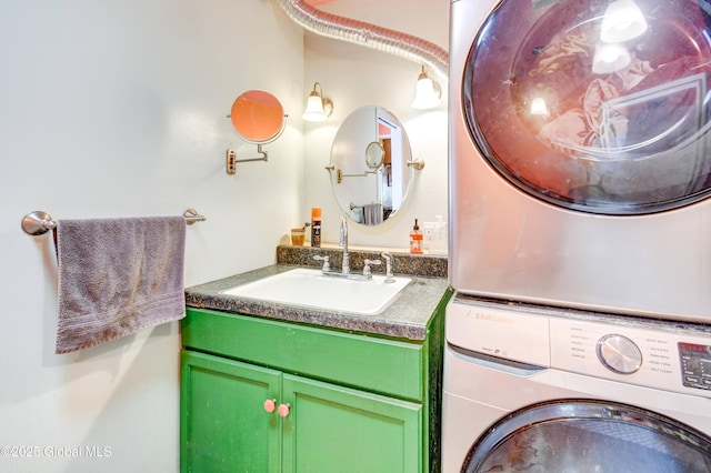 bathroom featuring vanity and stacked washer / drying machine