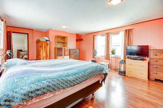 bedroom featuring light wood-type flooring