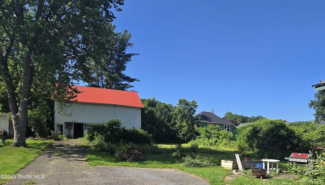110 Montgomery St, Canajoharie, NY 13317 - view of front of property with a metal roof