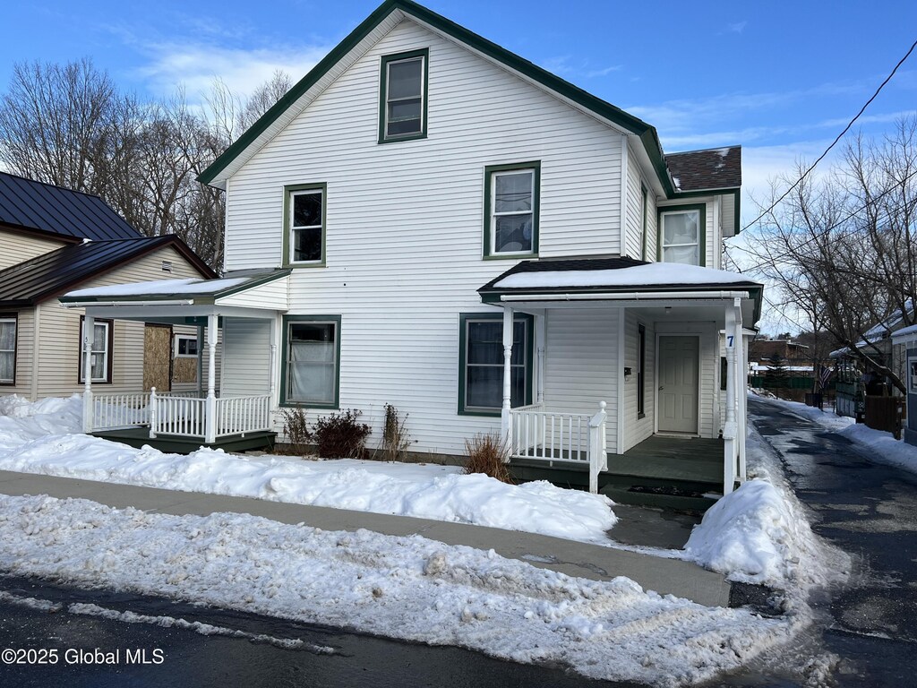 5-7 Factory St, Granville, NY 12832 - view of front facade featuring covered porch