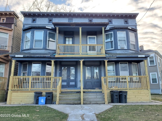 37-39 N Manning Blvd, Albany, NY 12206 - townhome / multi-family property with a porch and french doors