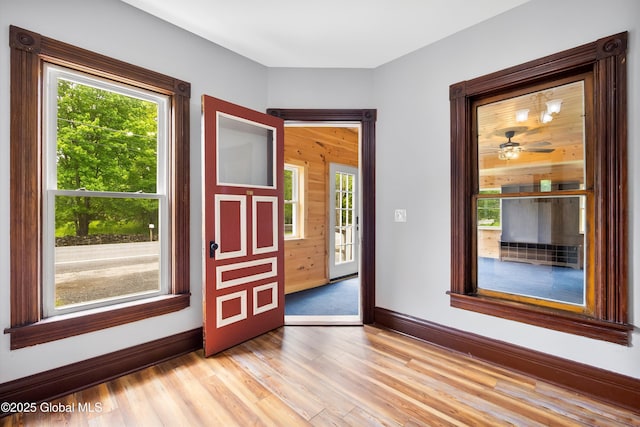 11208 State Route 22, Fort Ann, NY 12827 - foyer featuring light wood finished floors, healthy amount of natural light, and baseboards