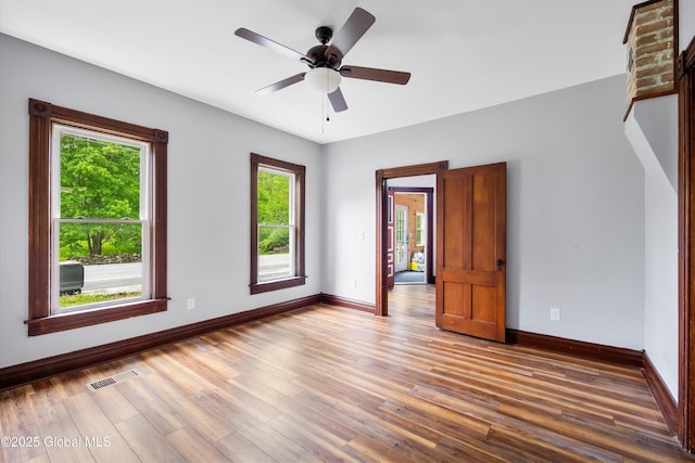 11208 State Route 22, Fort Ann, NY 12827 - empty room featuring plenty of natural light, baseboards, and wood finished floors