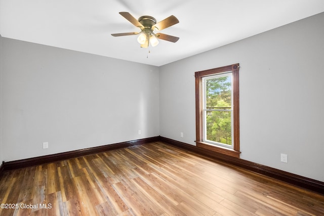 11208 State Route 22, Fort Ann, NY 12827 - unfurnished room with baseboards, wood finished floors, and ceiling fan