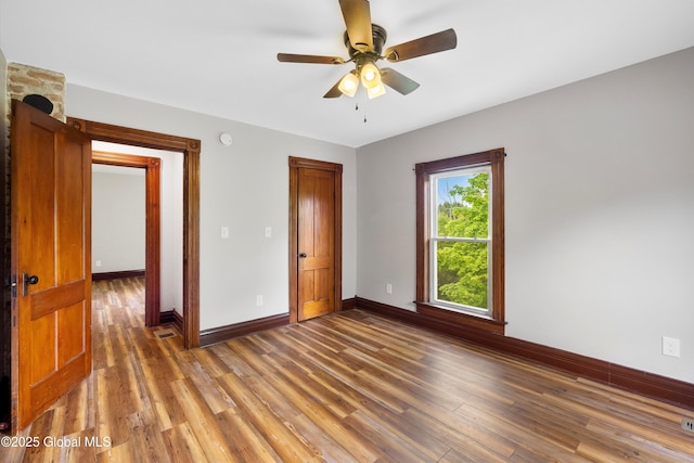 11208 State Route 22, Fort Ann, NY 12827 - unfurnished bedroom with baseboards, light wood-style flooring, and ceiling fan