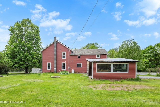 11208 State Route 22, Fort Ann, NY 12827 - back of house with a lawn and a chimney