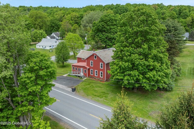 11208 State Route 22, Fort Ann, NY 12827 - aerial view of property and surrounding area featuring a heavily wooded area