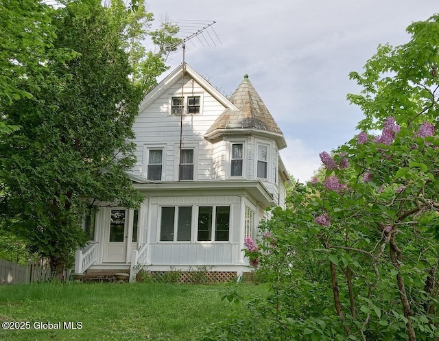 exterior space with a front lawn