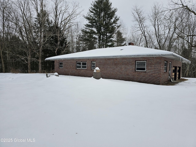 view of snow covered property