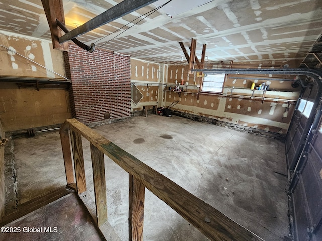 basement with brick wall