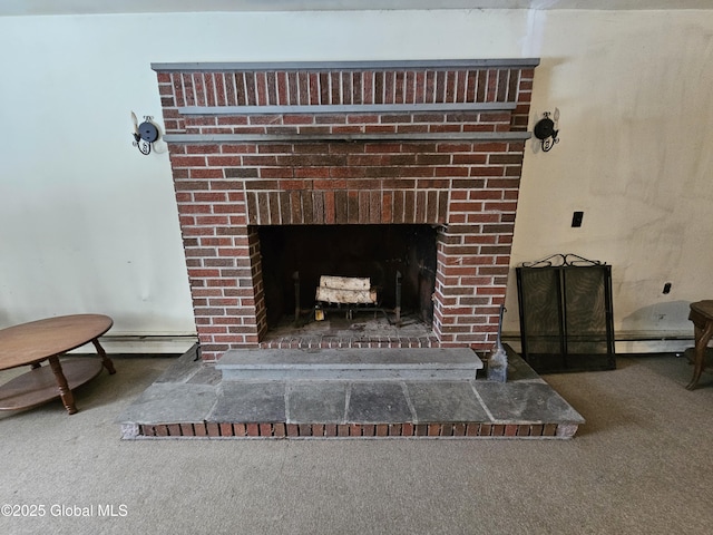 interior details featuring a baseboard radiator, carpet flooring, and a fireplace