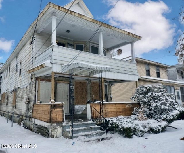 view of front of home featuring covered porch