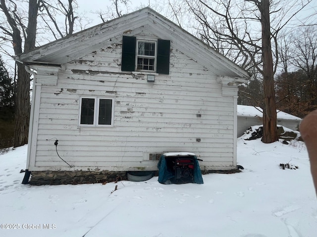 view of snow covered property