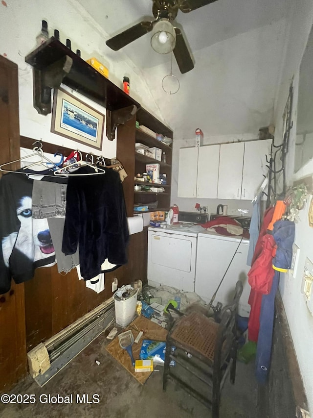 interior space with lofted ceiling, ceiling fan, independent washer and dryer, and white cabinets