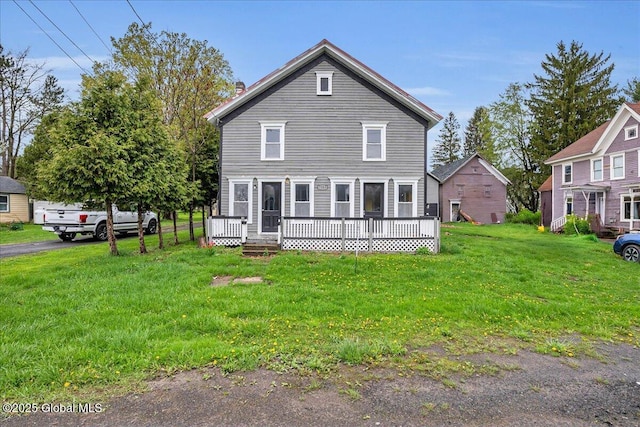 7383 State Highway 28, Exeter, NY 13315 - back of property with a yard and a deck
