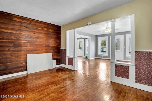 7383 State Highway 28, Exeter, NY 13315 - entryway with ceiling fan, wooden walls, baseboards, and wood-type flooring