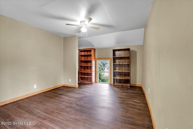 7383 State Highway 28, Exeter, NY 13315 - unfurnished living room featuring dark wood-style flooring, baseboards, and ceiling fan