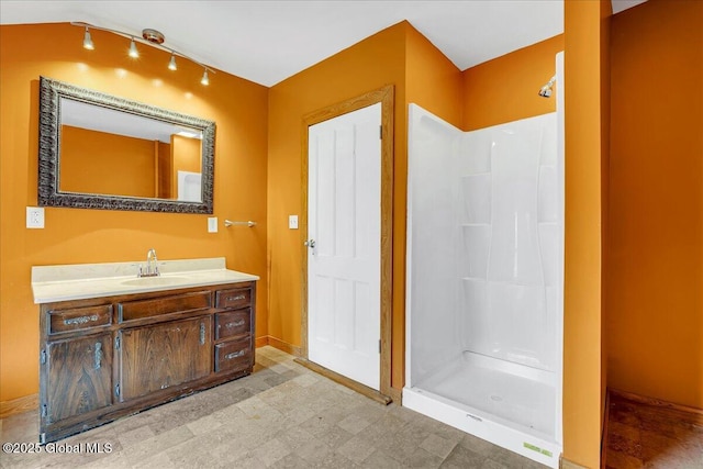 7383 State Highway 28, Exeter, NY 13315 - bathroom featuring walk in shower, tile patterned floors, baseboards, and vanity