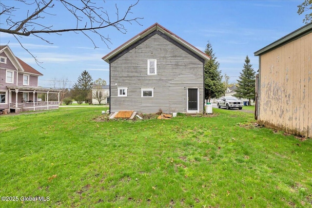 7383 State Highway 28, Exeter, NY 13315 - rear view of property featuring a yard