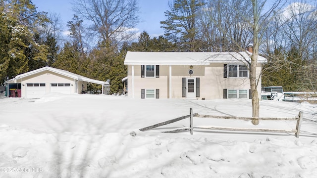 raised ranch with a detached garage