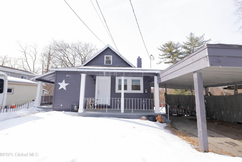 view of snow covered property