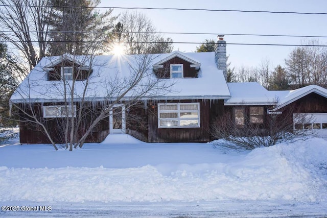 view of new england style home