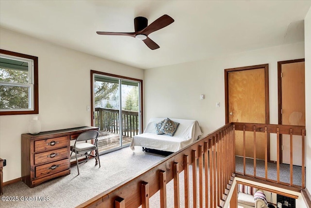 bedroom with access to outside, carpet floors, a ceiling fan, and baseboards