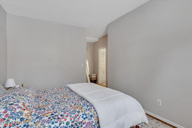 bedroom with a textured ceiling